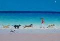 niña y perros corriendo en la playa